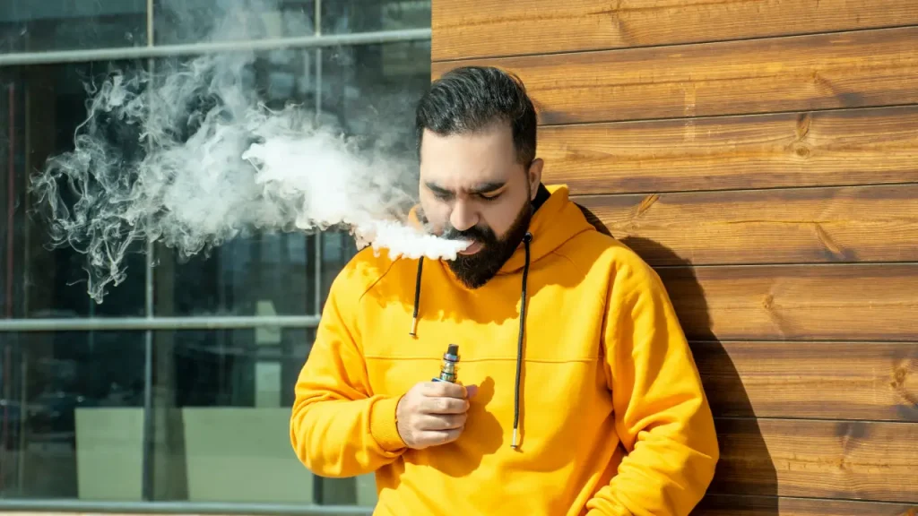 Vaping to Quit Smoking Image of man vaping.